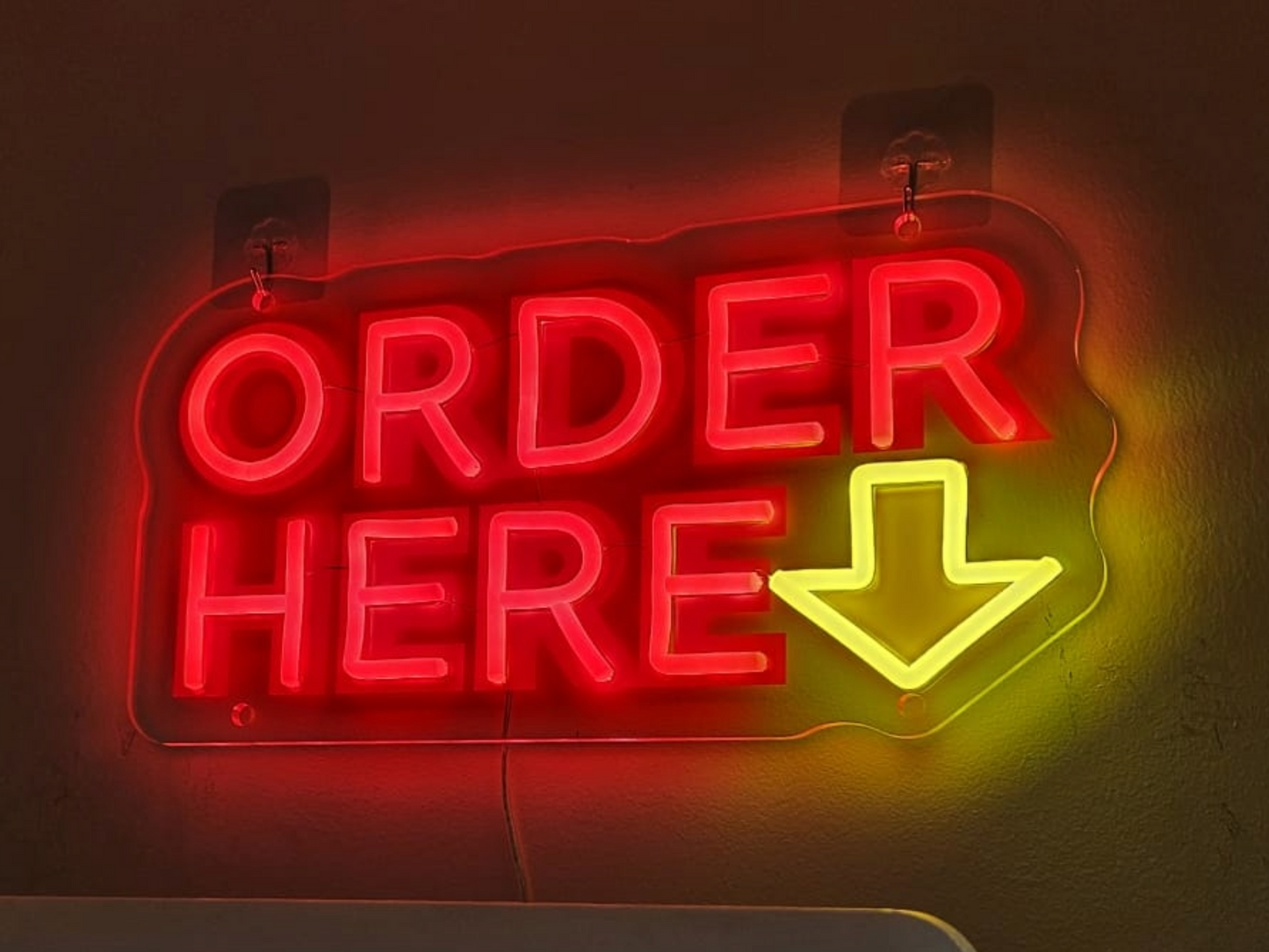 Neon 'Order Here' Sign